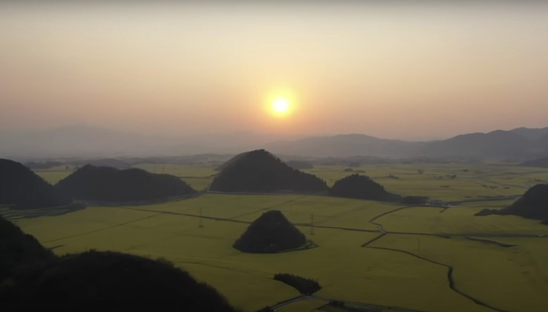 Luoping — Karst Cones in a Sea of Yellow